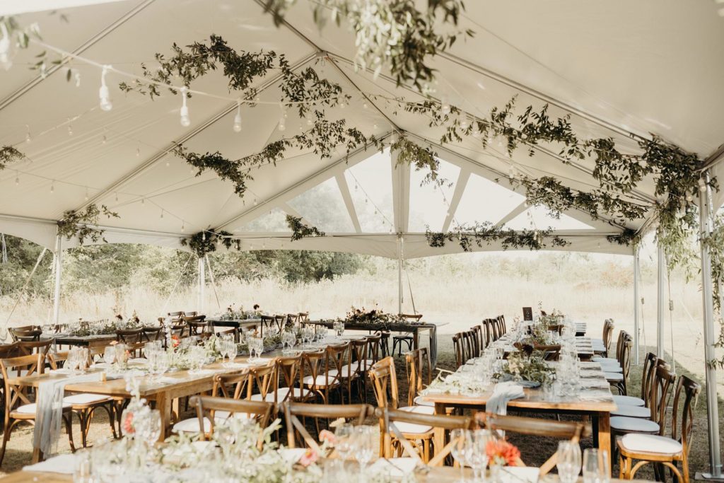 Cropped photo of the exterior of the top floor of an old stone building.